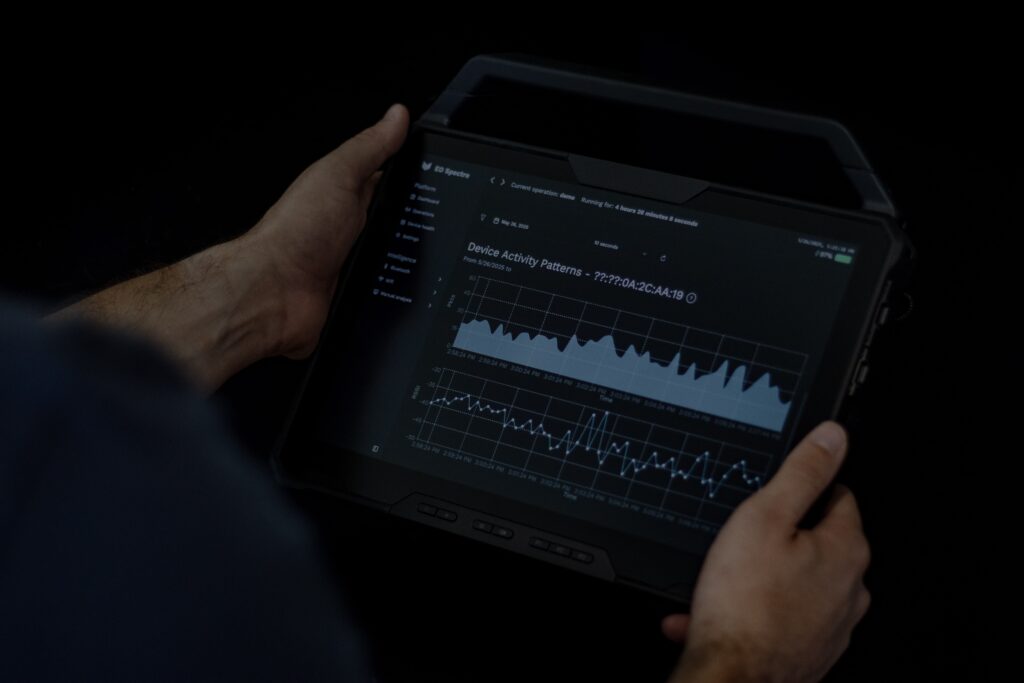 Standalone EO Spectre web application displaying aggregated signal intelligence data with GPS map overlays from multiple devices.